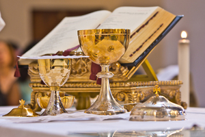 on the altar of the pyx and chalice mass they contain wine and hosts, blood and body of Christ